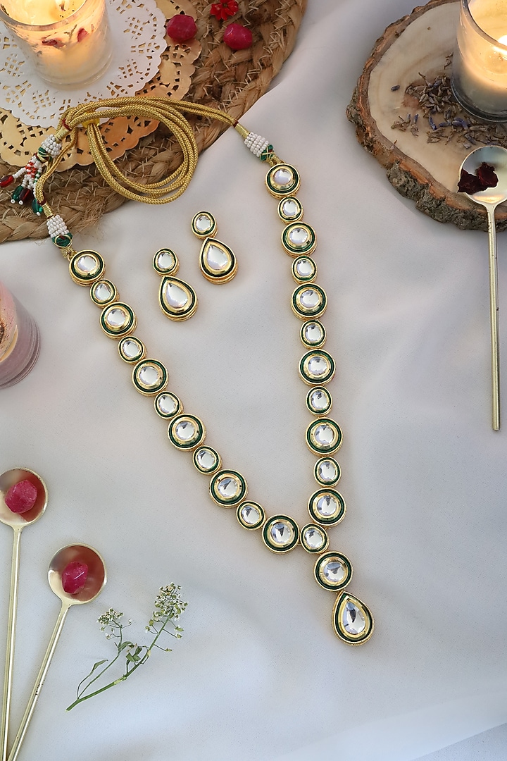 Gold Finish Necklace Set With Uncut Kundan by Paisley Pop at Pernia's Pop Up Shop