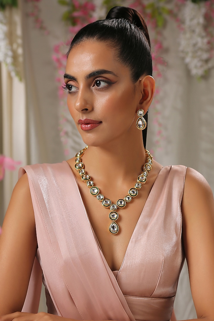 Gold Finish Necklace Set With Uncut Kundan by Paisley Pop at Pernia's Pop Up Shop