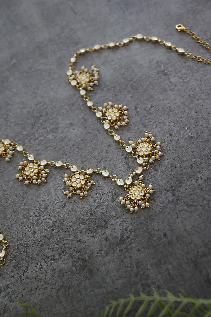 Gold Finish Kundan Polki & Shell Pearl Handcrafted Floral Waist Belt by Paisley Pop at Pernia's Pop Up Shop