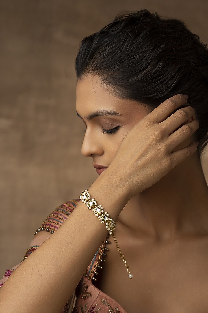 Gold Finish Kundan Polki & Freshwater Pearls Handcrafted Bracelet by Paisley Pop at Pernia's Pop Up Shop