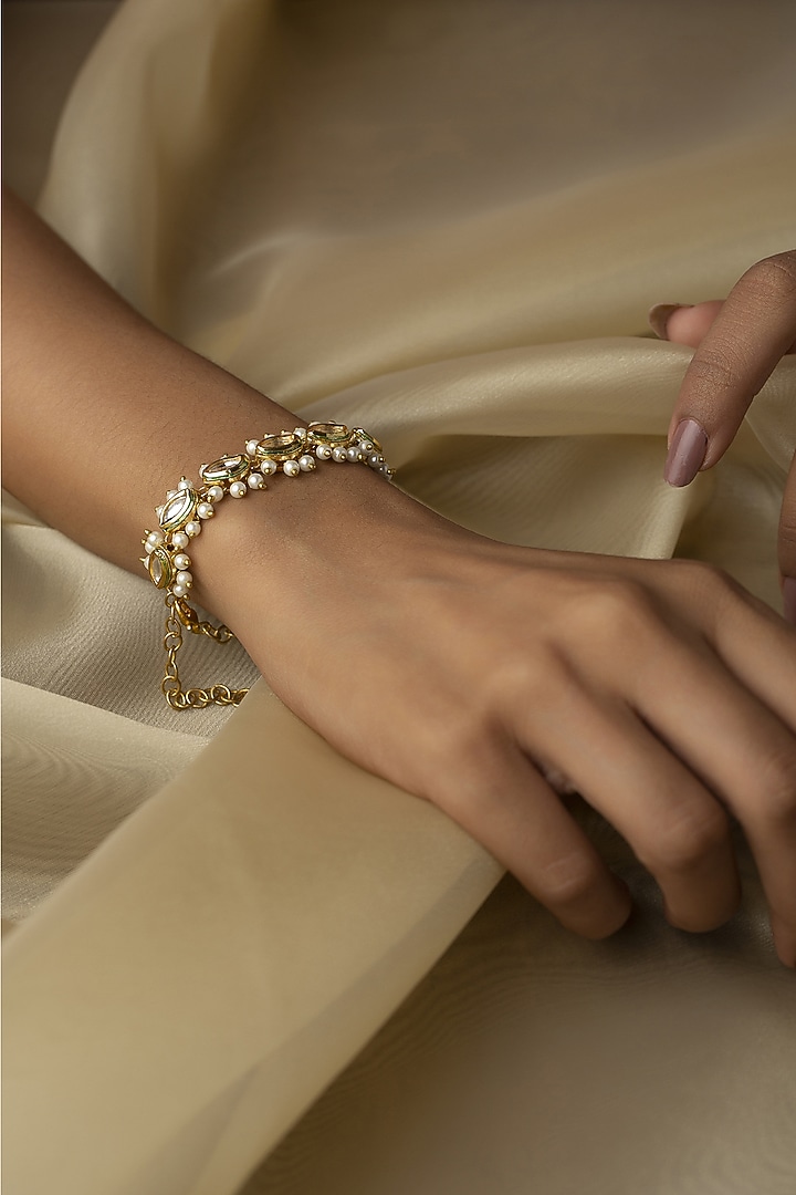 Gold Finish Kundan Polki & Freshwater Pearls Handcrafted Bracelet by Paisley Pop at Pernia's Pop Up Shop