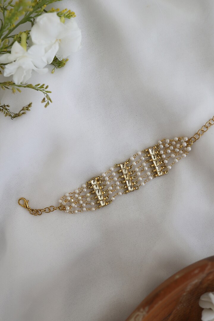 Gold Finish Kundan Polki & Pearls Handcrafted Bracelet by Paisley Pop at Pernia's Pop Up Shop