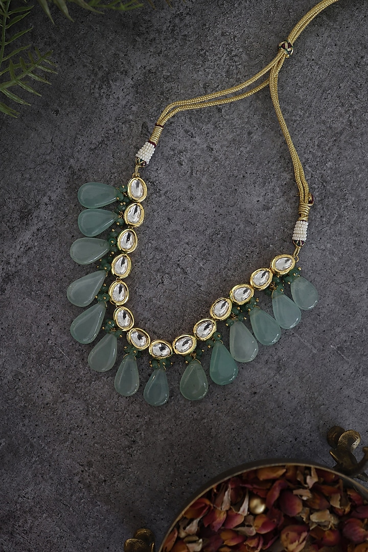 Gold Finish Kundan & Mint Fluorite Stone Necklace by Paisley Pop at Pernia's Pop Up Shop
