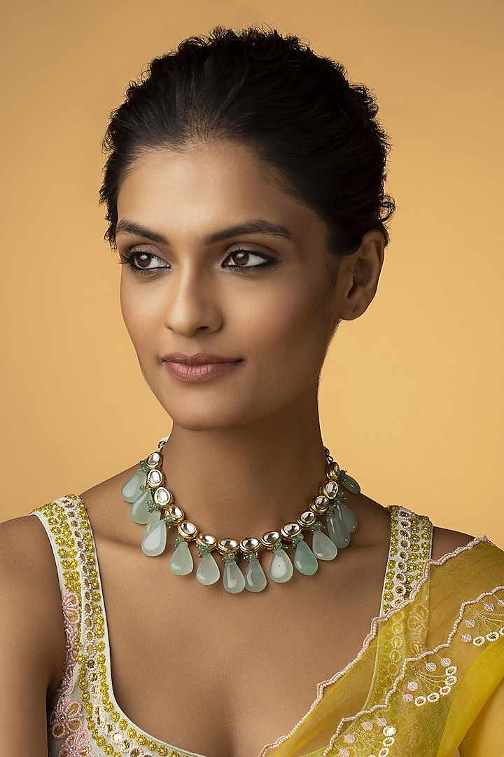 Gold Finish Kundan & Mint Fluorite Stone Necklace by Paisley Pop at Pernia's Pop Up Shop