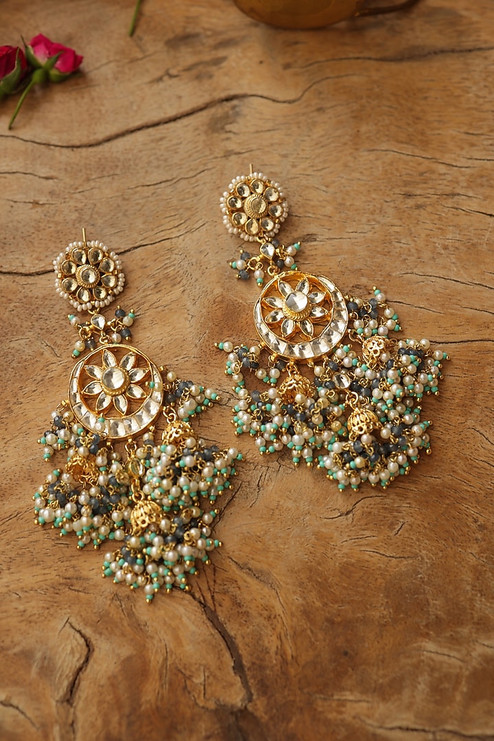Gold Finish Kundan Polki & Shell Pearl Jhumka Earrings by Paisley Pop at Pernia's Pop Up Shop