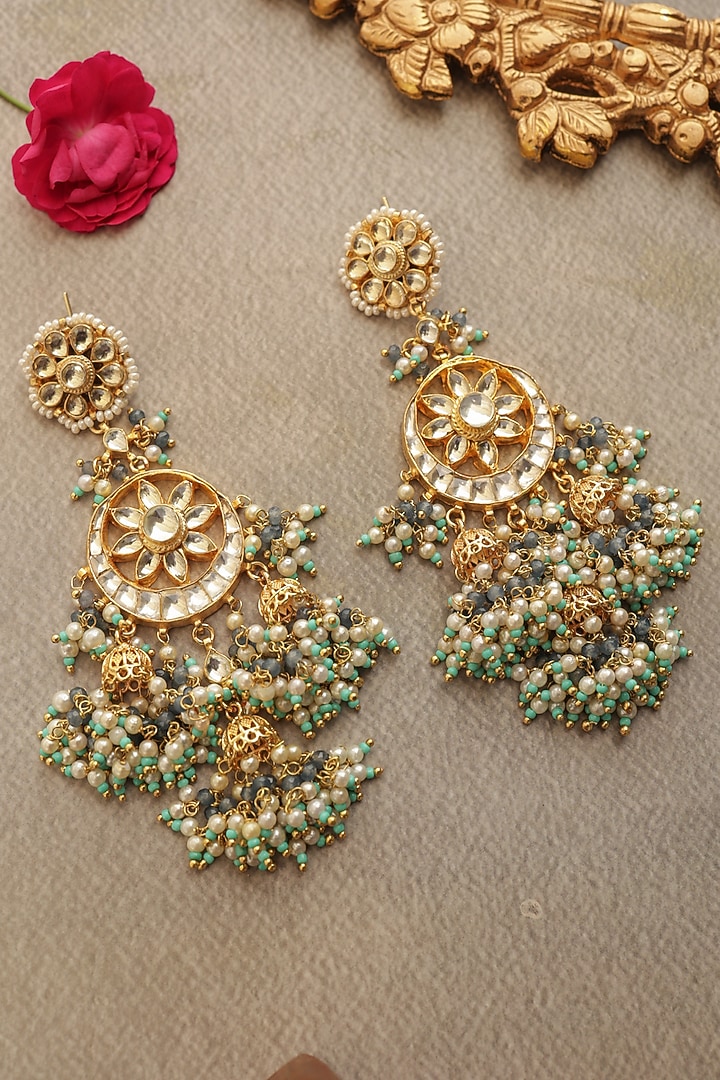 Gold Finish Kundan Polki & Shell Pearl Jhumka Earrings by Paisley Pop at Pernia's Pop Up Shop