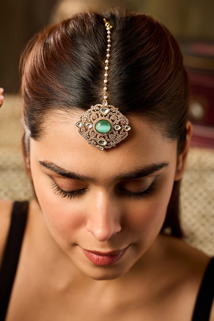 Gold Finish Mint Stone & Pearl Maangtikka by Paisley Pop at Pernia's Pop Up Shop