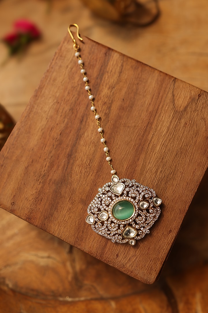 Gold Finish Mint Stone & Pearl Maangtikka by Paisley Pop at Pernia's Pop Up Shop