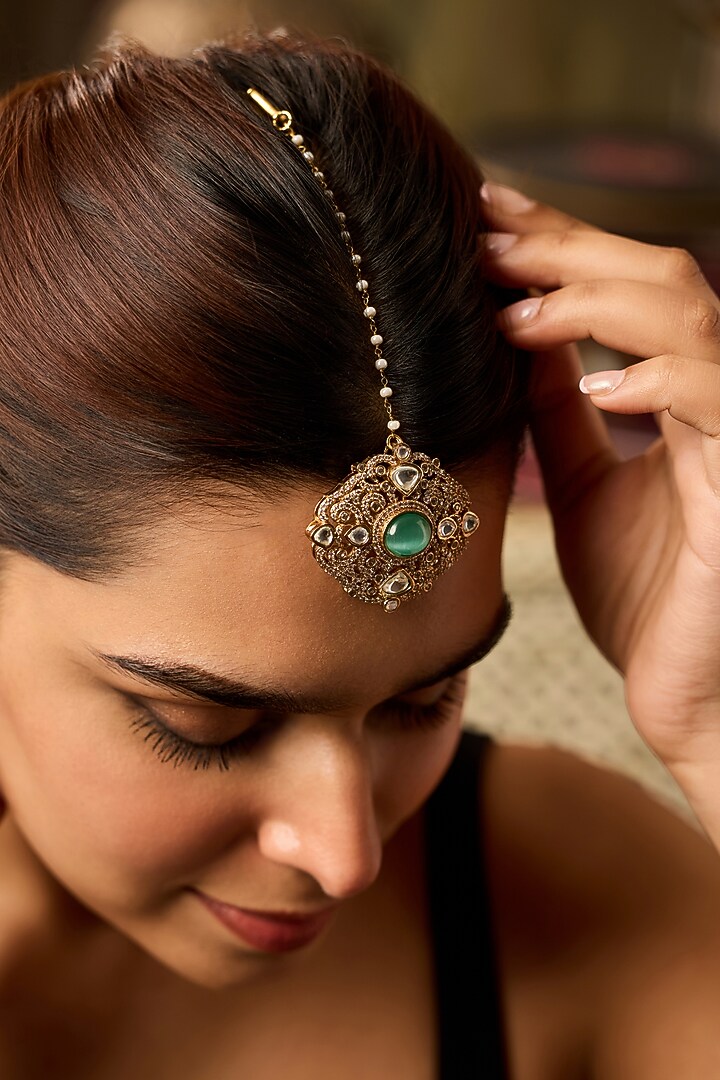 Gold Finish Mint Stone & Pearl Maangtikka by Paisley Pop at Pernia's Pop Up Shop