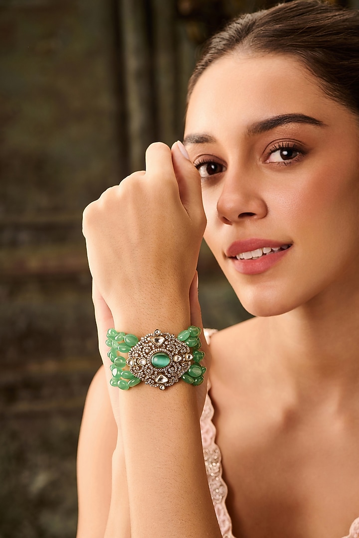 Gold Plated Kundan Polki & Green Onyx Bracelet by Paisley Pop at Pernia's Pop Up Shop