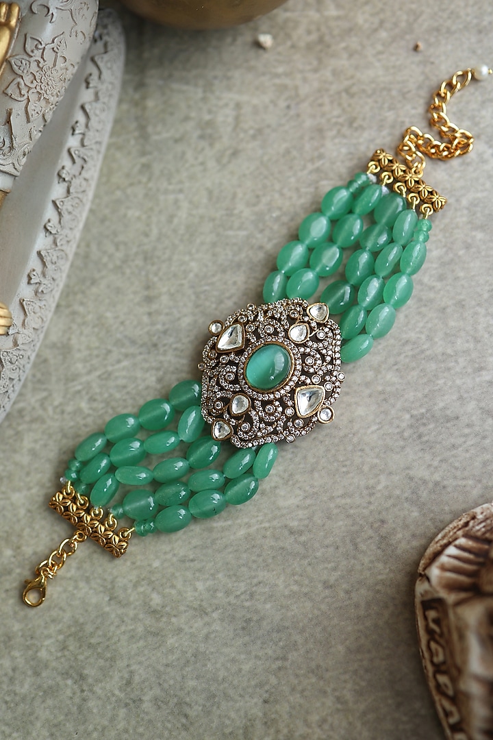 Gold Plated Kundan Polki & Green Onyx Bracelet by Paisley Pop at Pernia's Pop Up Shop