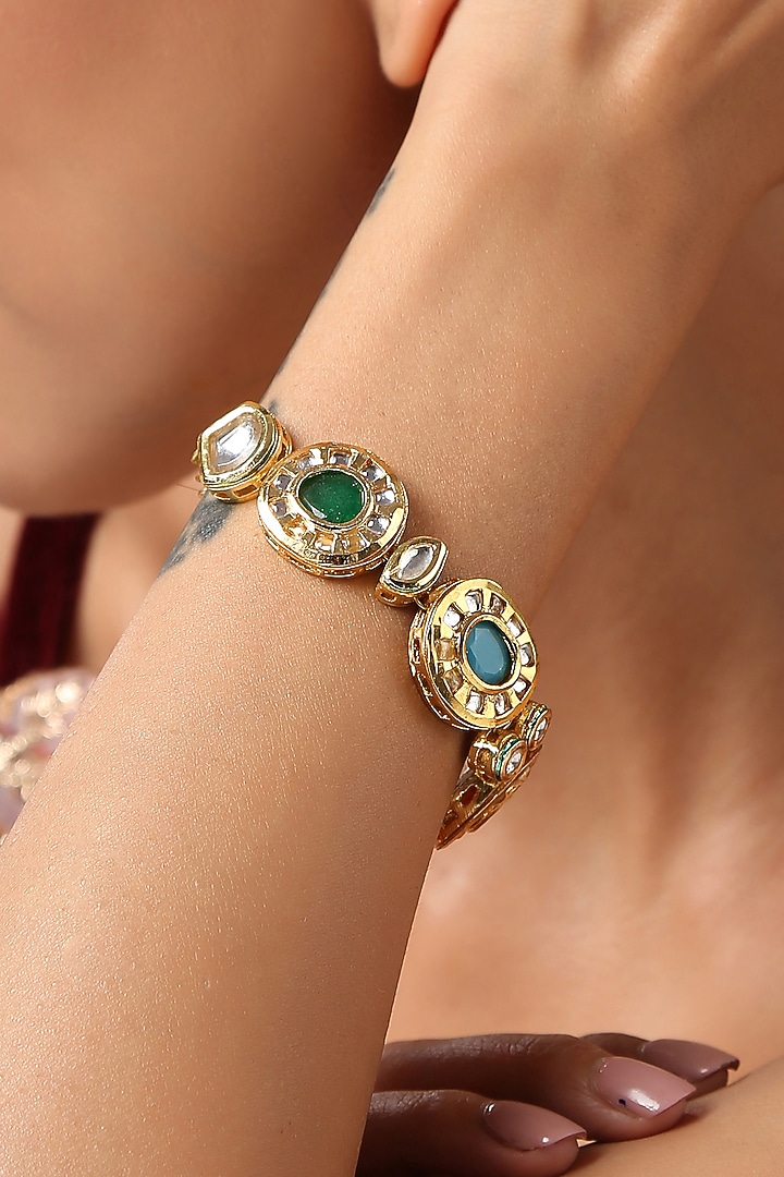 Gold Finish Navratna Stone Bracelet by Paisley Pop at Pernia's Pop Up Shop
