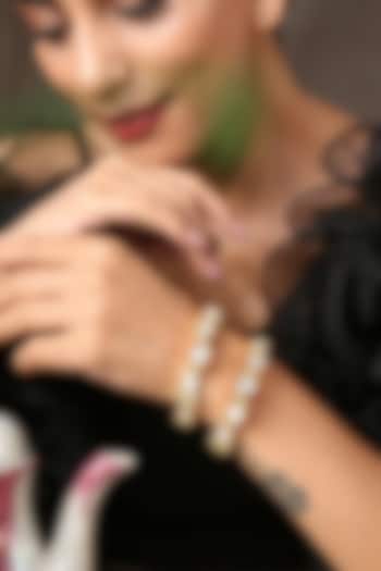 Gold Finish Kundan Polki Bangles (Set of 2) by Paisley Pop at Pernia's Pop Up Shop