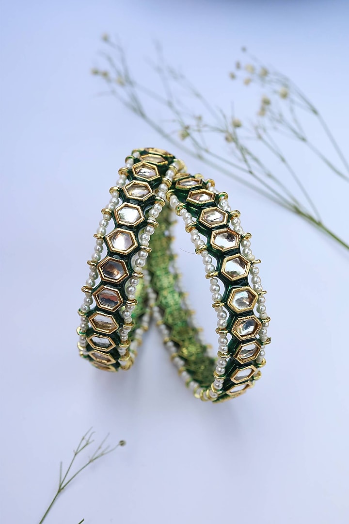 Gold Finish Kundan & Pearls Bangles (Set of 2) by Paisley Pop at Pernia's Pop Up Shop