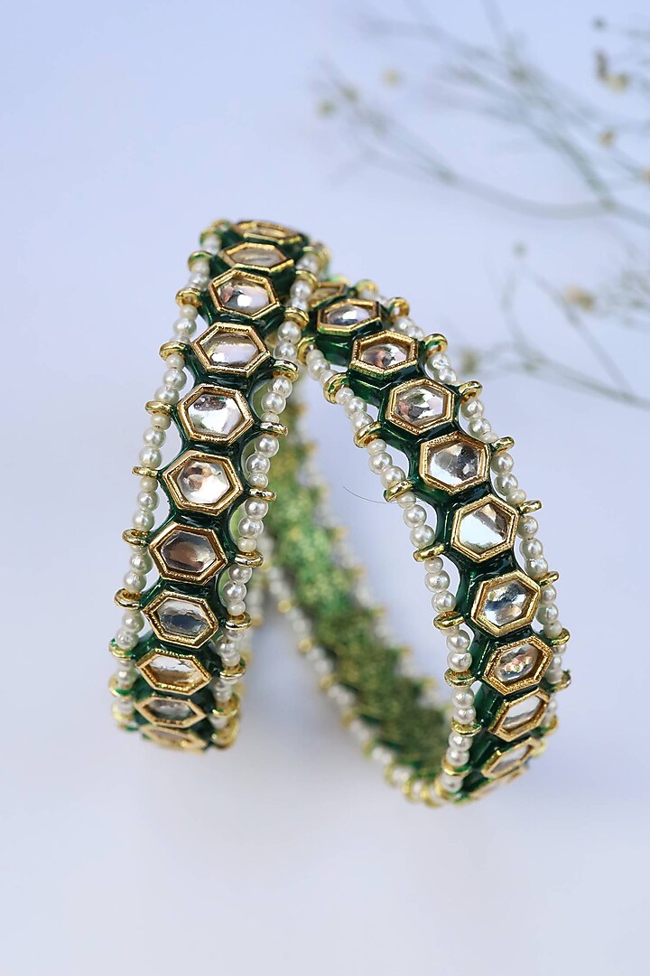 Gold Finish Kundan & Pearls Bangles (Set of 2) by Paisley Pop at Pernia's Pop Up Shop