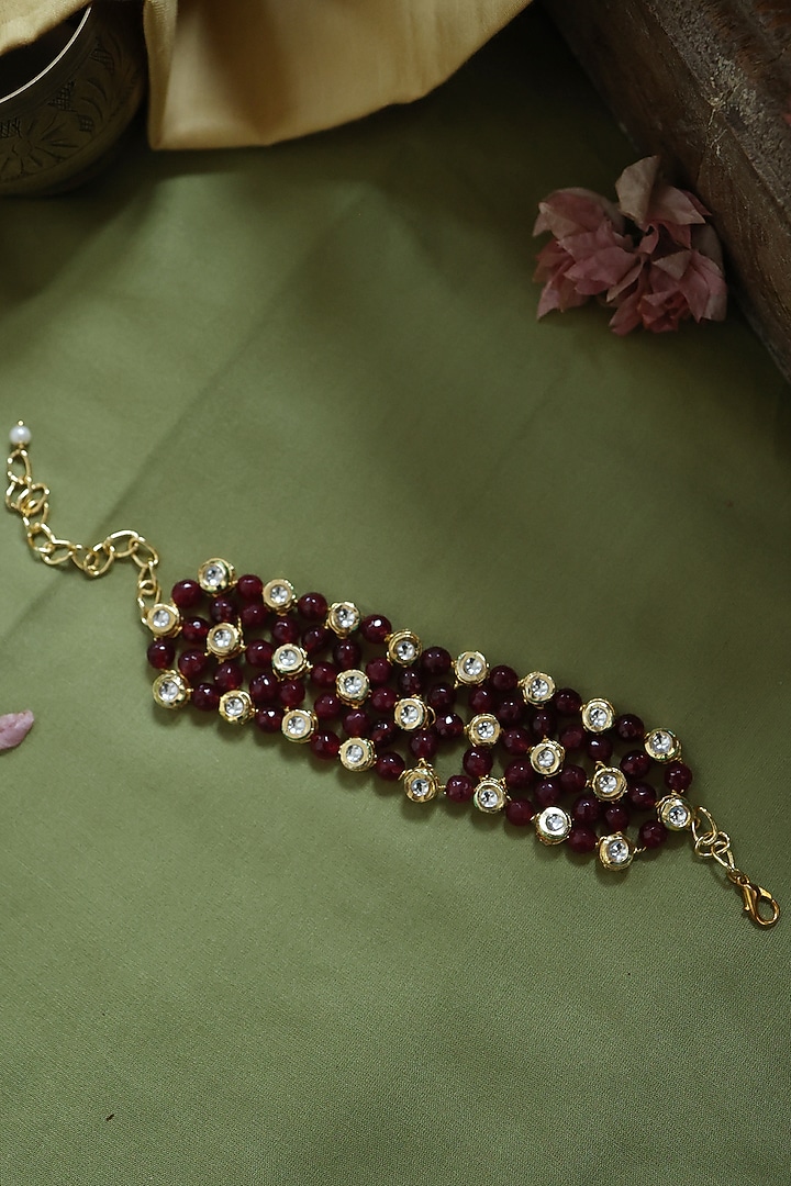 Gold Plated Kundan Polki & Red Stone Handcrafted Bracelet by Paisley Pop at Pernia's Pop Up Shop