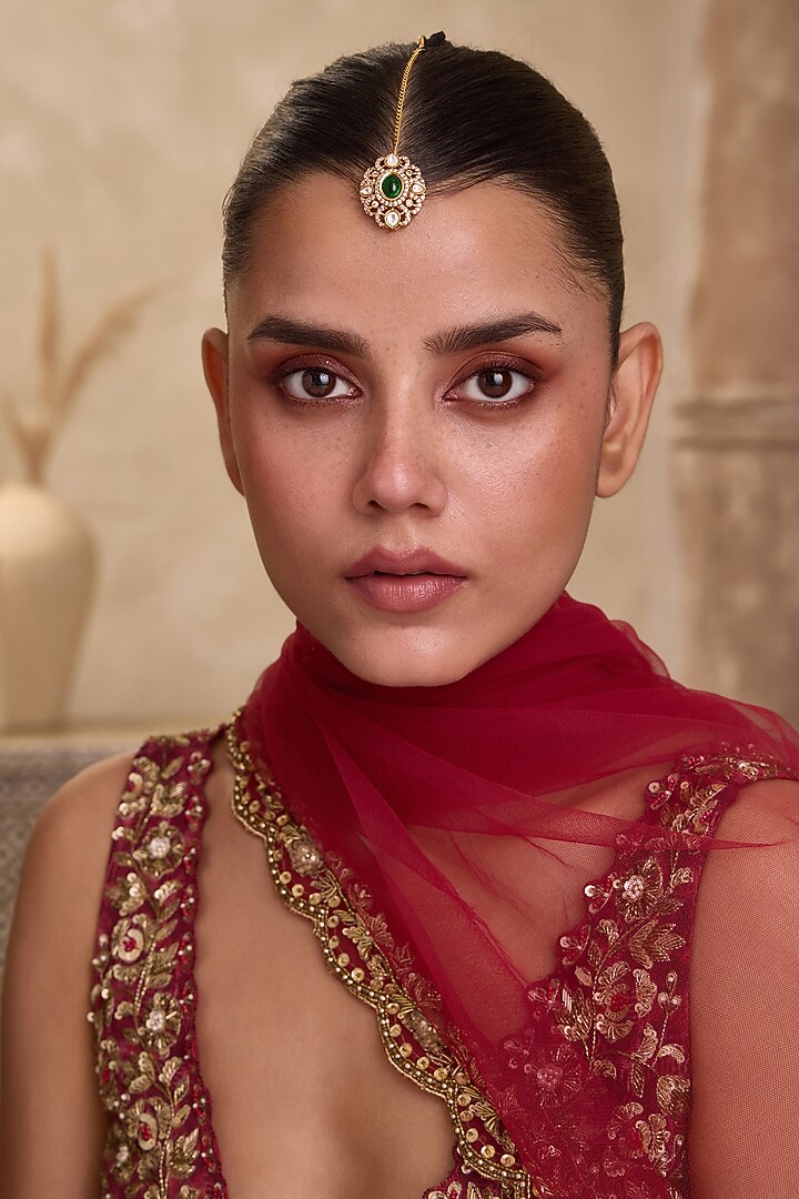 Gold Finish Kundan Polki & Oval Green Stone Maangtikka by Paisley Pop at Pernia's Pop Up Shop