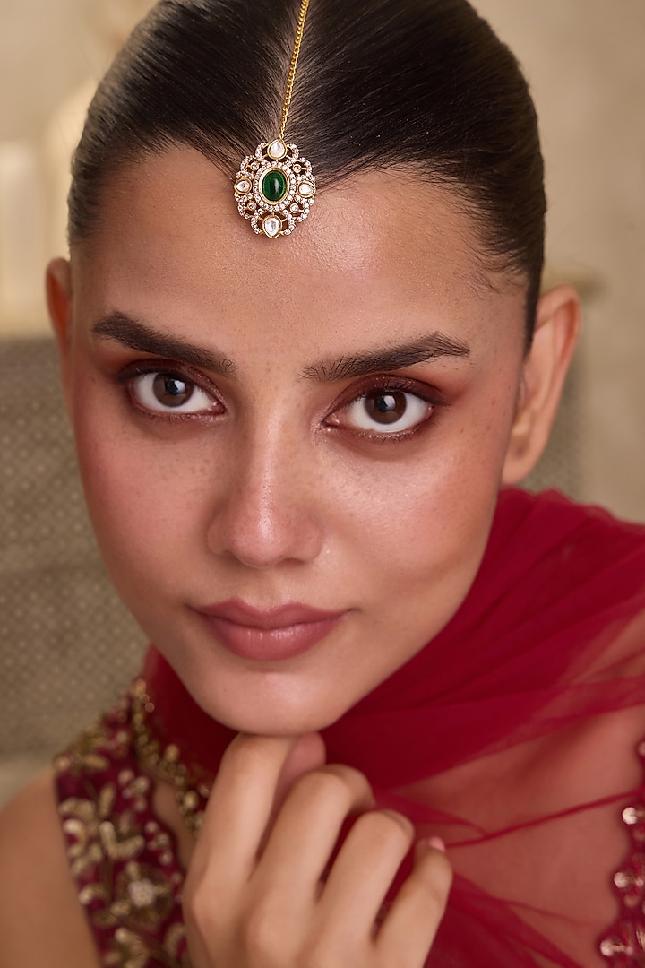 Gold Finish Kundan Polki & Oval Green Stone Maangtikka by Paisley Pop at Pernia's Pop Up Shop