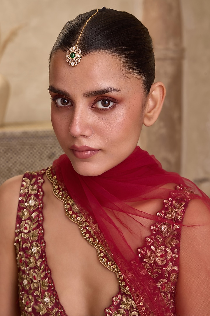 Gold Finish Kundan Polki & Oval Green Stone Maangtikka by Paisley Pop at Pernia's Pop Up Shop