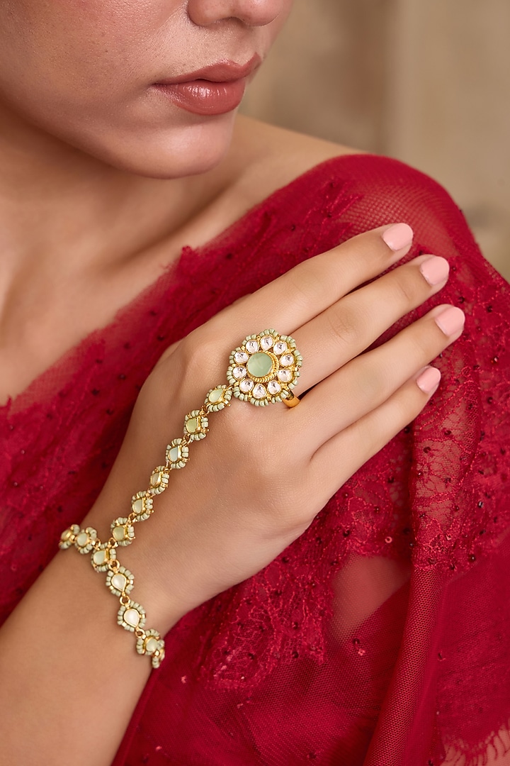 Gold Finish Mint Kundan Polki & Shell Pearl Adjustable Floral Hathphool by Paisley Pop at Pernia's Pop Up Shop