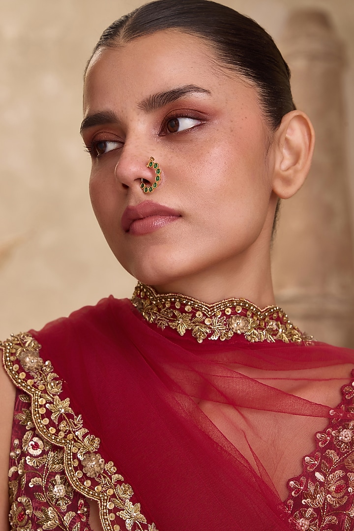 Gold Finish Kundan Polki & Emerald Stone Crescent-Shaped Nose pin by Paisley Pop at Pernia's Pop Up Shop