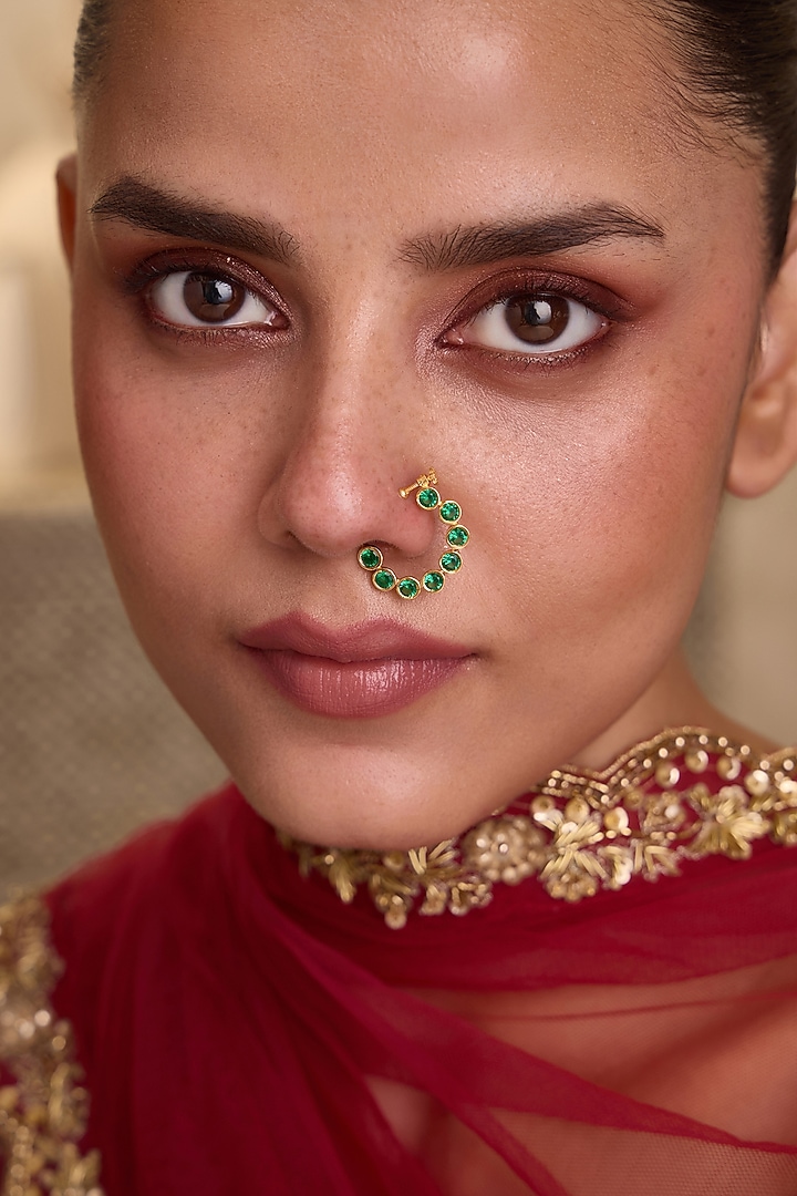 Gold Finish Kundan Polki & Emerald Stone Crescent-Shaped Nose pin by Paisley Pop at Pernia's Pop Up Shop