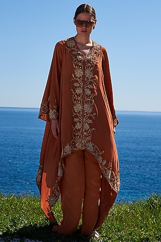 Rust Crepe Embroidered Asymmetrical Cape Set by Pinnacle by Shruti Sancheti