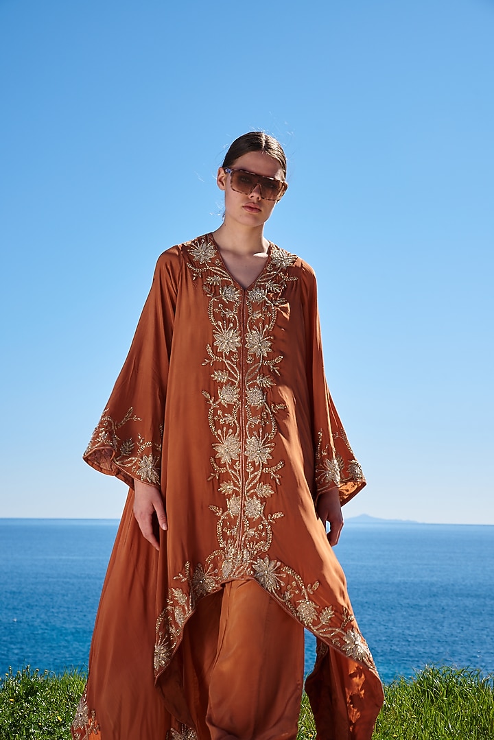 Rust Crepe Embroidered Asymmetrical Cape Set by Pinnacle by Shruti Sancheti at Pernia's Pop Up Shop