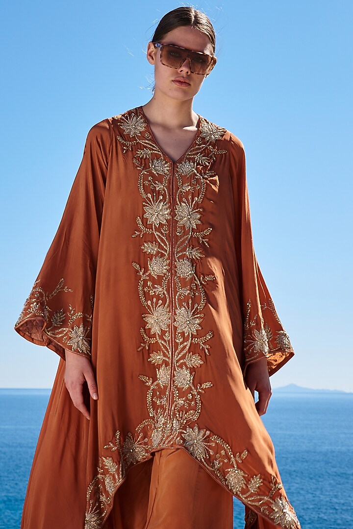 Rust Crepe Embroidered Asymmetrical Cape Set by Pinnacle by Shruti Sancheti at Pernia's Pop Up Shop