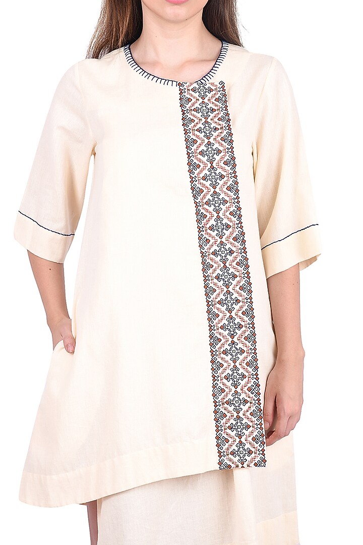 Ecru Tribal Embroidered Tunic by Pinnacle By Shruti Sancheti at Pernia's Pop Up Shop