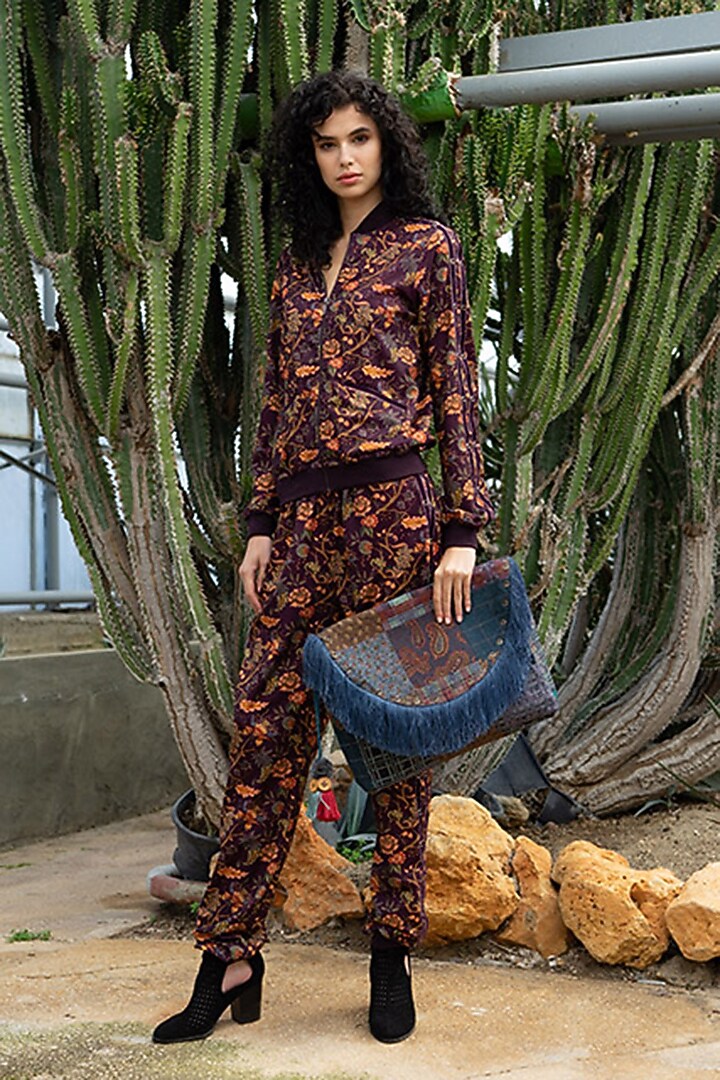 Burgundy Printed Knit Pants by Pinnacle By Shruti Sancheti at Pernia's Pop Up Shop