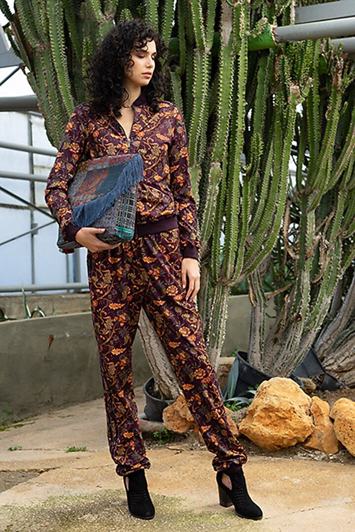 Burgundy Printed Knit Pants by Pinnacle By Shruti Sancheti at Pernia's Pop Up Shop
