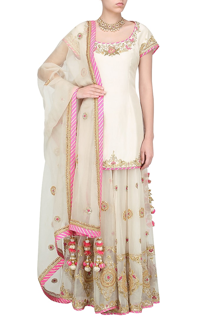 Off white and pink embroidered sharara set available only at Pernia's Pop Up Shop.