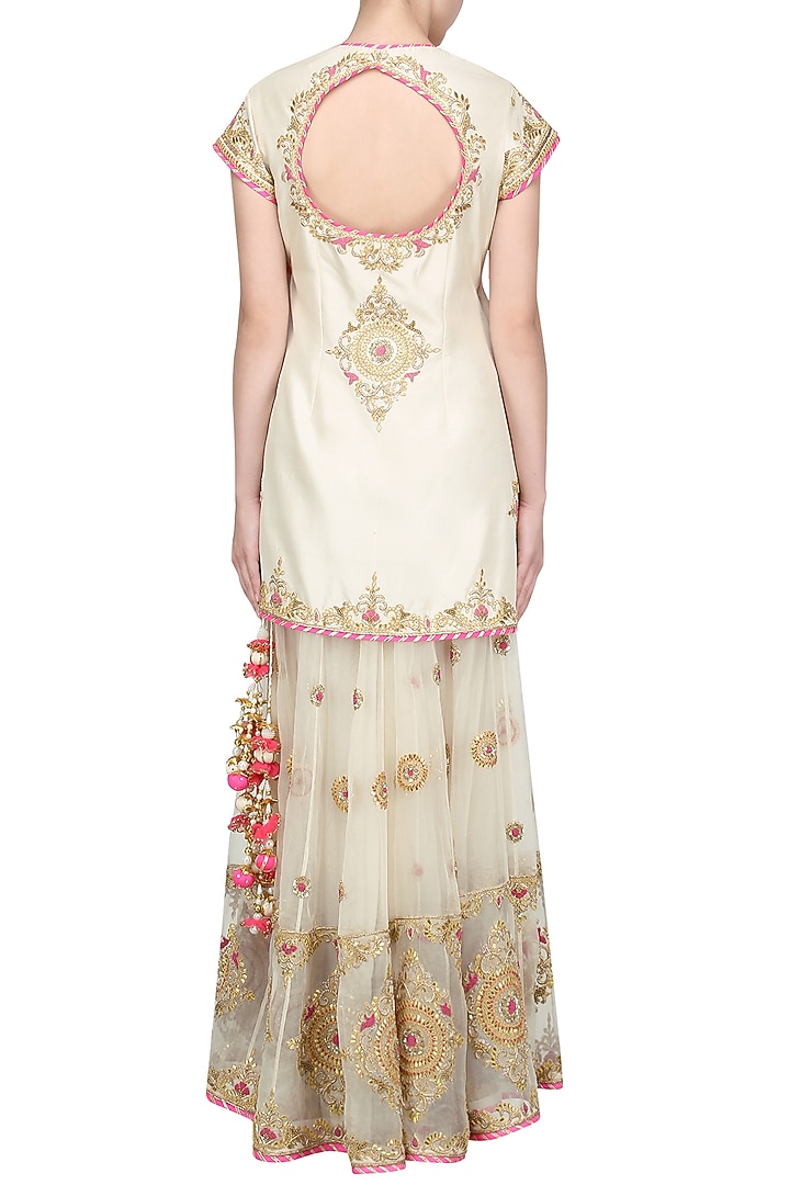 Off white and pink embroidered sharara set available only at Pernia's Pop Up Shop.