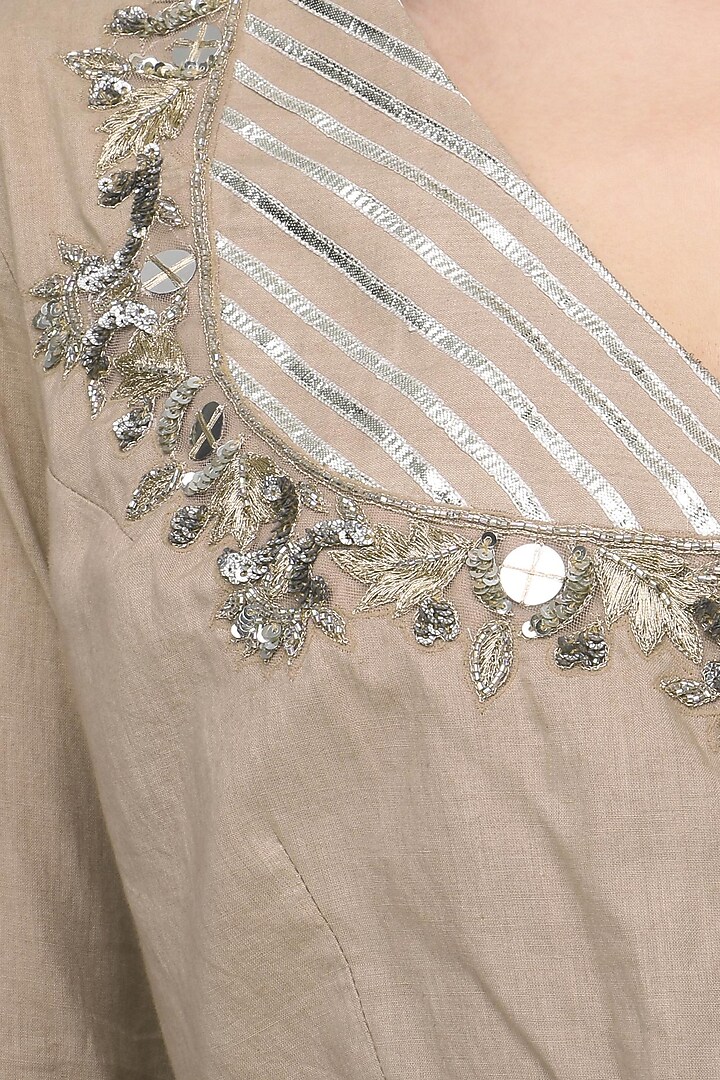 Beige metal sequins embroidered lehenga set available only at Pernia's Pop Up Shop.