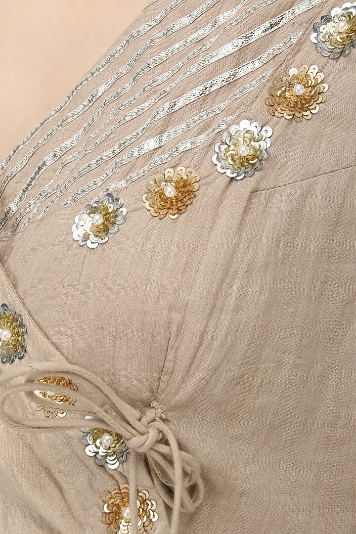 Beige angrakha anarkali and gharara pants set available only at Pernia's Pop Up Shop.