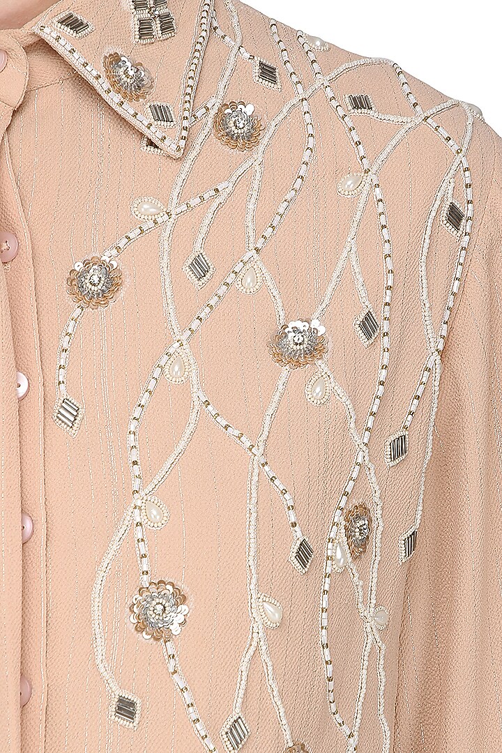 Peach embroidered shirt with drape skirt available only at Pernia's Pop Up Shop.