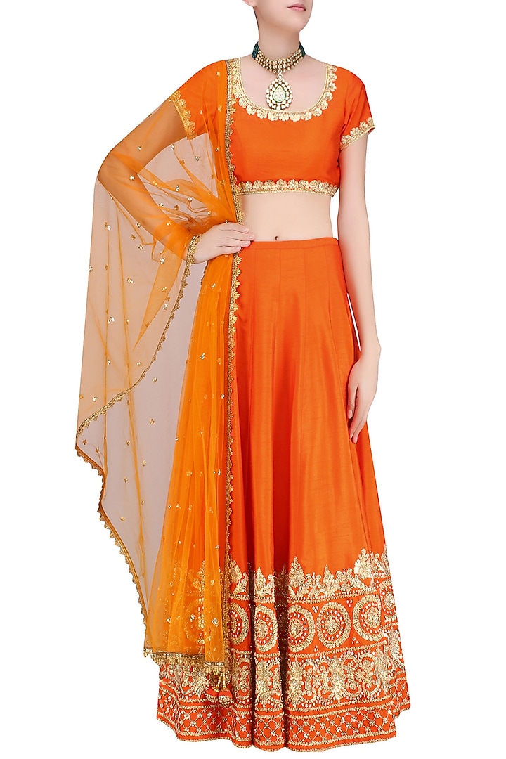Orange and gold gota patti embroidered lehenga set available only at Pernia's Pop Up Shop.