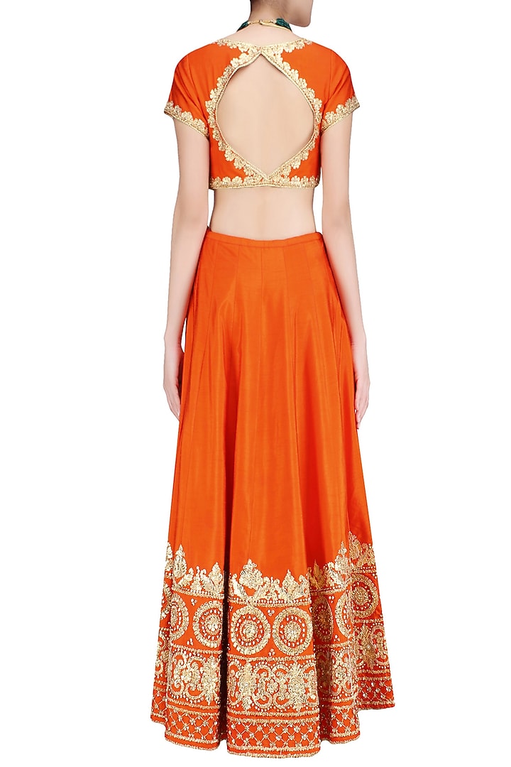 Orange and gold gota patti embroidered lehenga set available only at Pernia's Pop Up Shop.