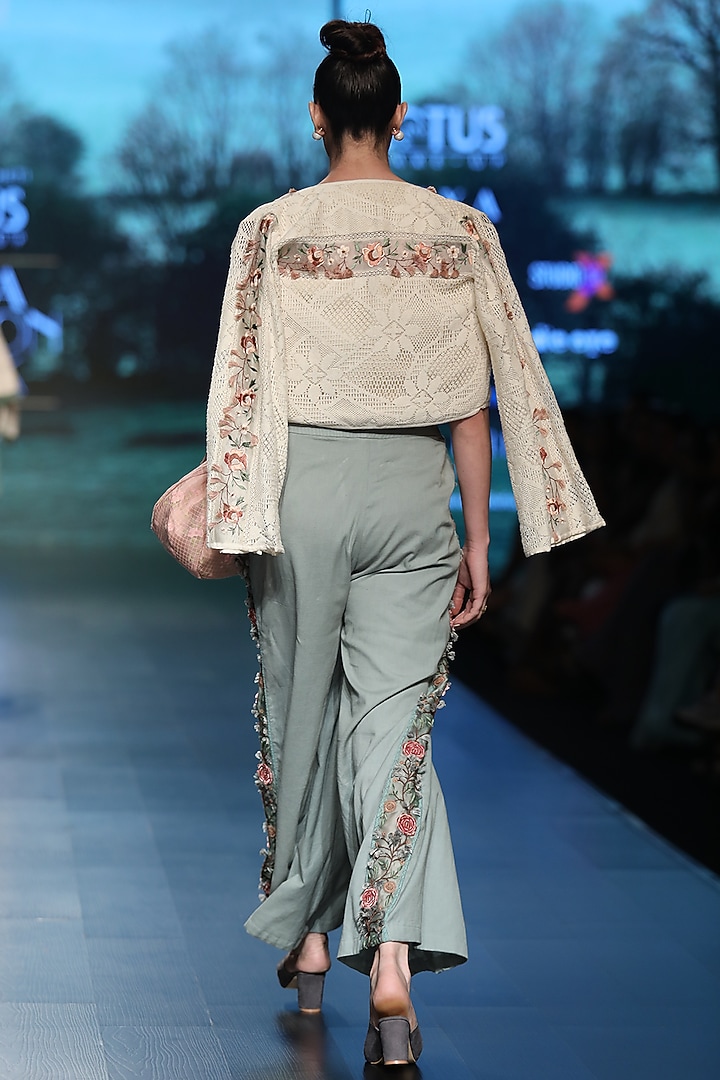 Light beige embroidered crop jacket with top by Pinnacle By Shruti Sancheti at Pernia's Pop Up Shop