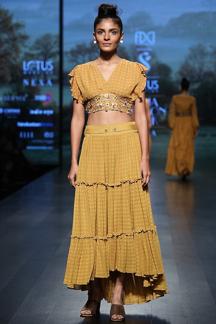 Mustard embroidered crop top with skirt by Pinnacle By Shruti Sancheti