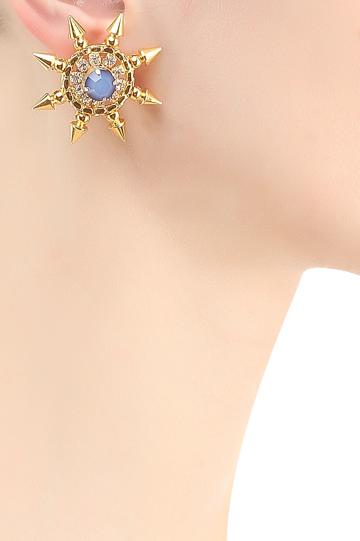 Gold plated blue swarovski sun earrings available only at Pernia's Pop Up Shop.
