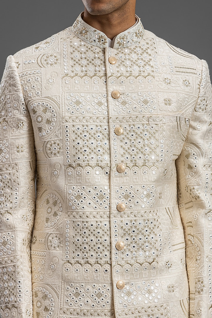 Ivory Blended Raw Silk Embroidered Wedding Sherwani Set by PURUSHAM at Pernia's Pop Up Shop