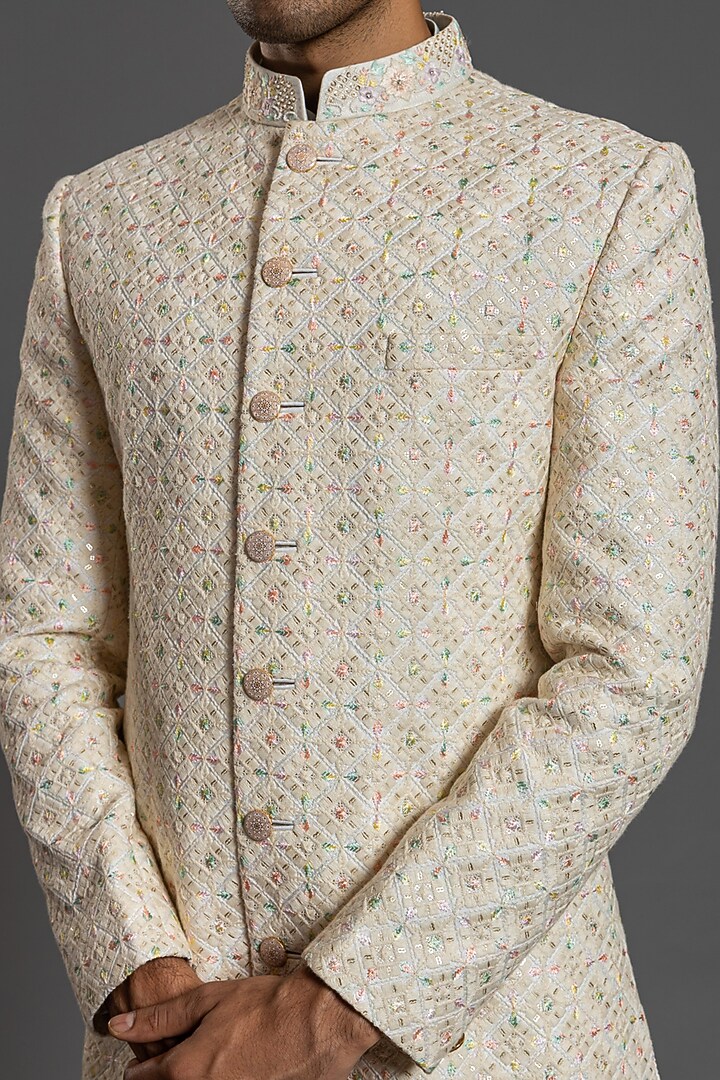 Ivory Blended Raw Silk Embroidered Wedding Sherwani Set by PURUSHAM at Pernia's Pop Up Shop