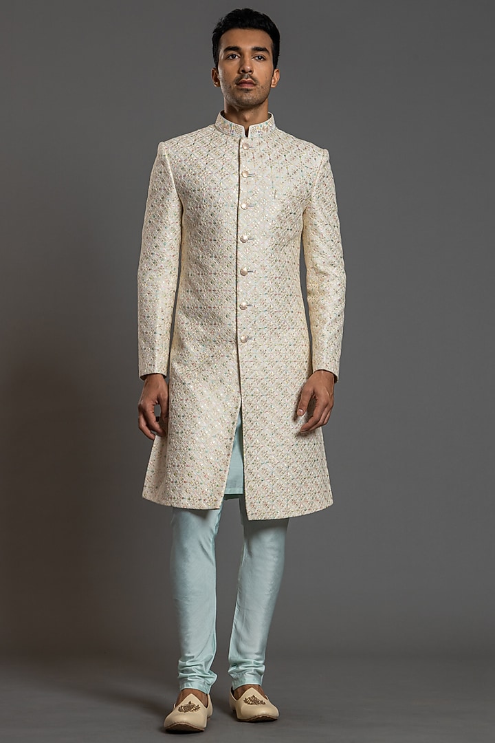 Ivory Blended Raw Silk Embroidered Wedding Sherwani Set by PURUSHAM at Pernia's Pop Up Shop