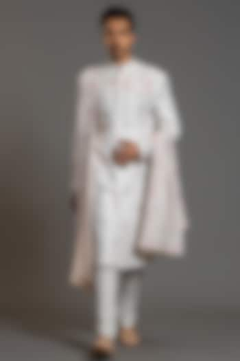 Ivory Blended Raw Silk Embroidered Groom Sherwani Set by PURUSHAM at Pernia's Pop Up Shop