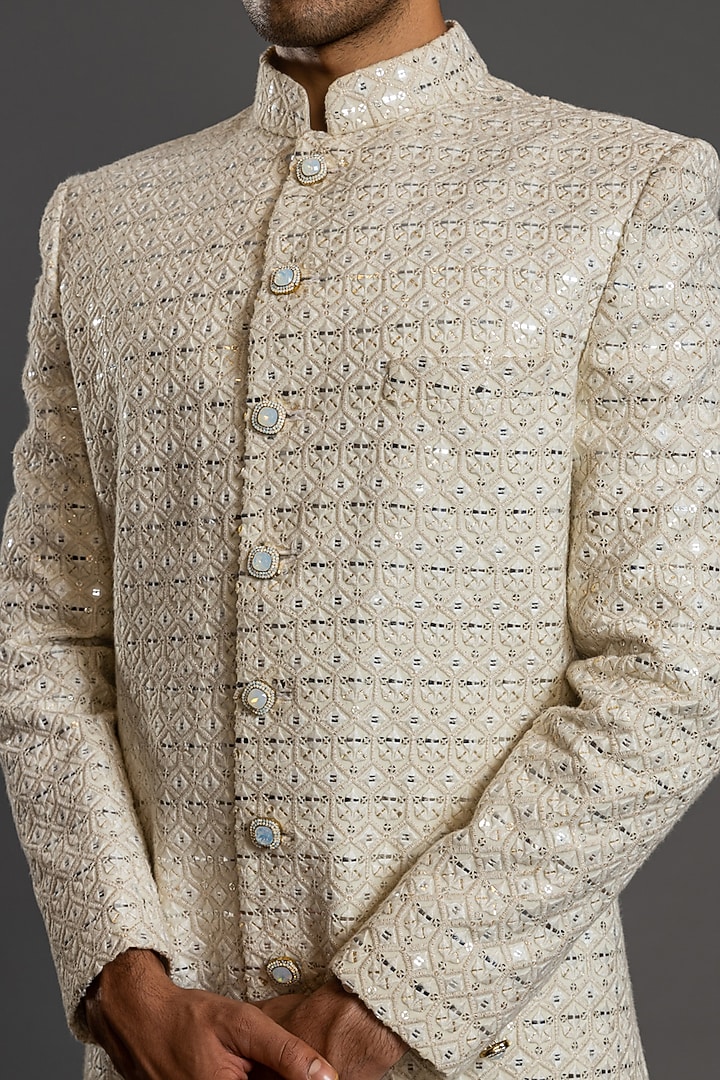 Ivory Blended Raw Silk Embroidered Wedding Sherwani Set by PURUSHAM at Pernia's Pop Up Shop