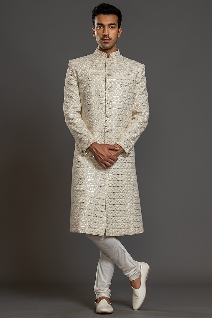 Ivory Blended Raw Silk Embroidered Wedding Sherwani Set by PURUSHAM at Pernia's Pop Up Shop