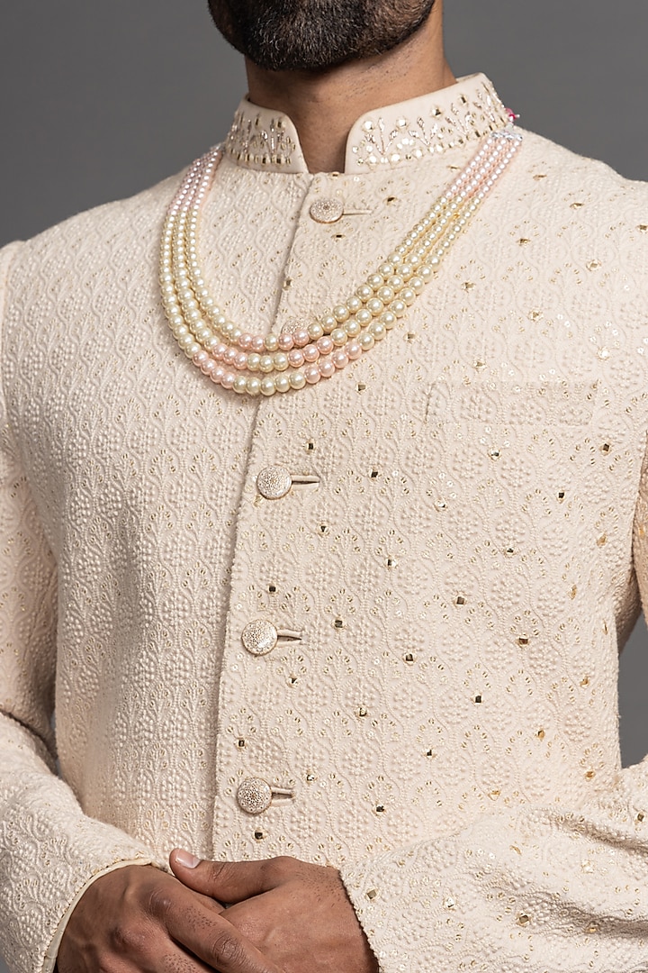 Dark Ivory Blended Raw Silk Embroidered Wedding Sherwani Set by PURUSHAM at Pernia's Pop Up Shop