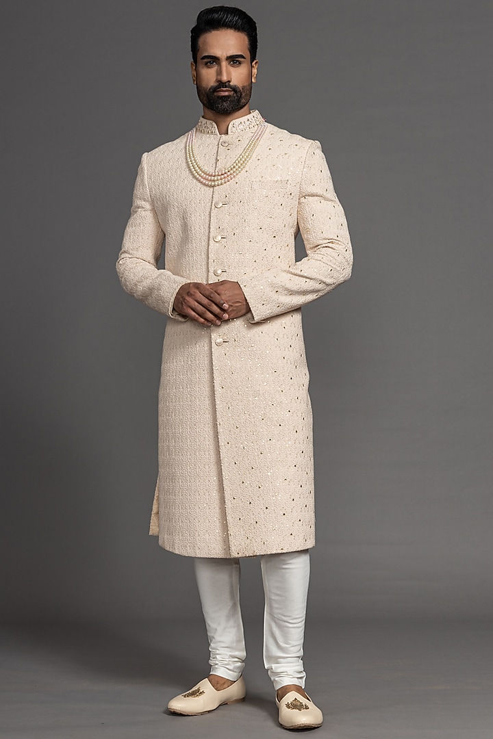 Dark Ivory Blended Raw Silk Embroidered Wedding Sherwani Set by PURUSHAM at Pernia's Pop Up Shop